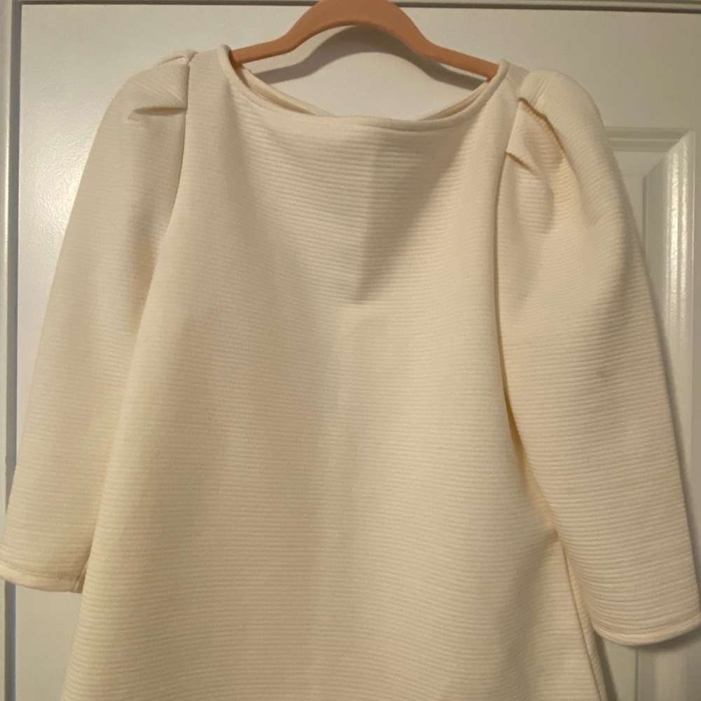 Only been worn a few times. Super cute top.